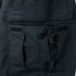 A pair of black trauma shears is partially tucked into a dark utility pocket with Velcro flaps on the Condor Women's Protector EMS Pants.