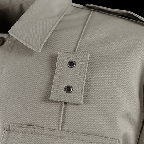 Close-up of the Condor Womens Class B Uniform Shirt in beige, showing the collar, pocket top, and shoulder strap with two metal grommets—ideal for EDC or military-inspired looks. On SALE now!.