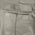 Close-up of the Condor Women's Class B Uniform Shirt in beige, highlighting the fabric pocket with two hook-and-loop fasteners on the flap and one on the pocket body, all securely fastened.