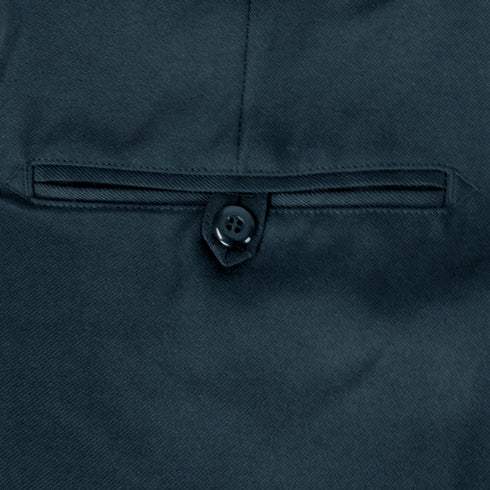Close-up of Condor Womens Class B Uniform Pants, featuring dark fabric and a single welt pocket with a buttoned flap—design inspired by classic military outerwear. Now on SALE.