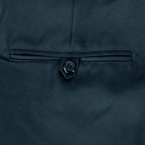 Close-up of a dark-colored fabric pocket on the Condor Women's Class B Uniform Pants, secured with a button through a tab.