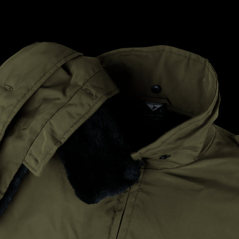 Close-up of the Condor Guardian Duty Jacket in olive green, featuring a faux fur lining and snap-button collar. On SALE.