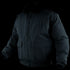 The Condor Guardian Duty Jacket | SALE is a black winter jacket with a front zipper, two large flap pockets, buttoned chest pocket, elastic cuffs, and high collar. Ideal for law enforcement use. Displayed on a mannequin.