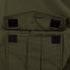 Close-up of the Condor Guardian Duty Jacket in olive green, featuring a fabric pocket with a pointed flap and four black Velcro patches for fastening.