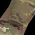 Close-up of the Condor Long Sleeve Combat Shirt Gen II in MultiCam, showing digital-patterned fabric with green, brown, and tan tones and a folded edge.