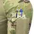 A Condor Long Sleeve Combat Shirt Gen II - Scorpion OCP sleeve with a silver and black pen plus a blue pen placed in the sleeve’s pen pocket.