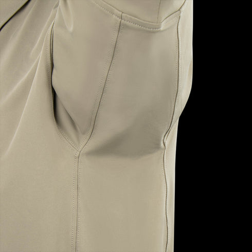 Close-up of a Condor Short Sleeve Dri-Flex Tactical Polo in beige, highlighting sleeve stitching details and seam construction.