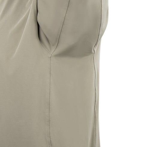 Close-up of the Condor Short Sleeve Dri-Flex Tactical Polo in beige, highlighting the seam and part of the sleeve with visible stitching.
