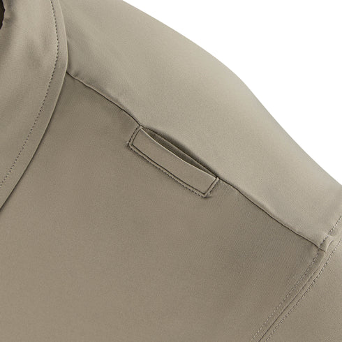 Close-up of the Condor Short Sleeve Dri-Flex Tactical Polo in khaki, highlighting the shoulder epaulet detail with a fabric loop.