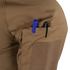 Close-up of the Condor Short Sleeve Combat Shirt Gen II’s brown, lightweight sleeve pocket holding a blue and a black pen, with a velcro patch below the pocket opening.