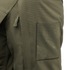 Close-up of an olive green Aegis Waterproof Parka pocket featuring a zipper pull labeled Condor and a large rectangular Velcro patch.
