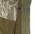 Close-up of the interior of the Condor Aegis Waterproof Parka, featuring a shiny mesh lining, a vertical zippered pocket, and a button detail near the edge.