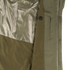 Close-up of the interior of the Condor Aegis Waterproof Parka, featuring a shiny mesh lining, a vertical zippered pocket, and a button detail near the edge.