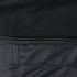 Close-up of Condor's Core Softshell Vest in black: the upper section features a soft, fuzzy fabric, while the lower section displays a textured material with a visible seam.