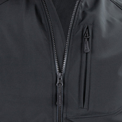 Close-up of the Condor Core Softshell Vest in black, featuring a partially unzipped main zipper and a vertical zippered chest pocket—ideal for EDC or range days.