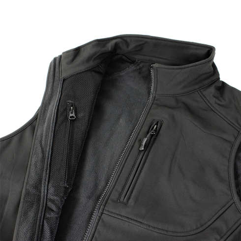 A close-up of the Condor Core Softshell Vest in black, ideal for EDC, shows its zippered chest pocket and partially opened main zipper.