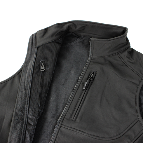 A close-up of the Condor Core Softshell Vest in black, ideal for EDC, shows its zippered chest pocket and partially opened main zipper.