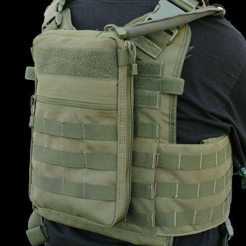 A person wears the Condor Tidepool Hydration Carrier in Scorpion OCP, featuring MOLLE webbing, a zippered back pouch, and adjustable shoulder straps—perfect for military or law enforcement use.