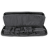 A Condor 36" Javelin Rifle Case in black is unzipped and open, revealing interior compartments with various pouches and gear attachments.