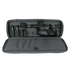A Condor 36" Javelin Rifle Case in gray displays a black rifle with accessories, magazines, and attachments organized inside its padded, open interior.