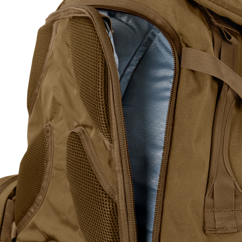 Close-up of the Condor Orion Assault Backpack 50L in brown, showing a partially opened zipper that reveals the blue interior lining.