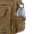 A plastic water bottle sits in the side mesh pocket of a tan Condor Elite Metropolis Briefcase, a versatile bag by Condor featuring multiple zippered compartments, popular with military and first responders.