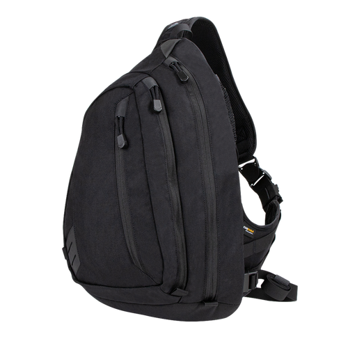 The Condor Elite Sector Sling Bag 18L by Condor features two zippered compartments, a small side pocket, and an adjustable padded shoulder strap in tactical black.
