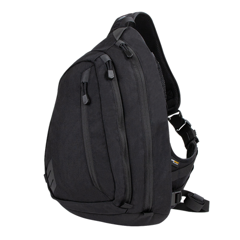 The Condor Elite Sector Sling Bag 18L by Condor features two zippered compartments, a small side pocket, and an adjustable padded shoulder strap in tactical black.