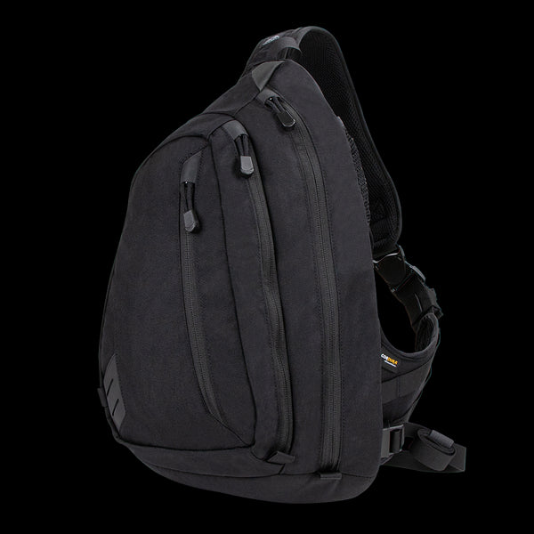 The Condor Elite Sector Sling Bag 18L by Condor features two zippered compartments, a small side pocket, and an adjustable padded shoulder strap in tactical black.