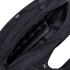 A close-up view of the open Condor Elite Sector Sling Bag 18L by Condor, highlighting its interior compartments and zipper details.