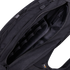 A close-up view of the open Condor Elite Sector Sling Bag 18L by Condor, highlighting its interior compartments and zipper details.