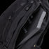 A Condor Elite Sector Sling Bag 18L in black is shown with a partially open zipper, revealing a protective ballistic plate inside.