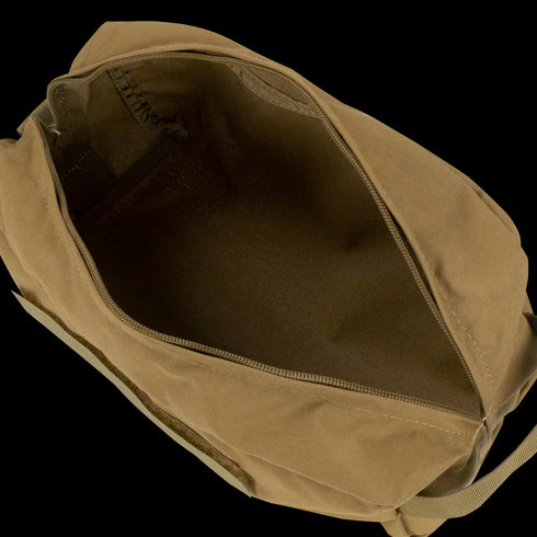 A Condor Kit Bag in MultiCam Black is shown from above with the zipper open, displaying an empty main compartment and an inner pocket.