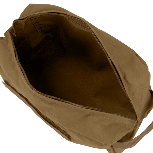 The Condor Kit Bag, made of brown canvas with a zipper, is shown open and empty to reveal its spacious inner compartment—perfect for bushcraft adventures or trips to the shooting range.