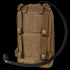 The Condor LCS Tidepool Hydration Carrier is a tan tactical pack featuring MOLLE webbing, shoulder straps, and a black drinking hose—ideal for bushcraft trips or as part of your EDC gear.