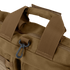Close-up of the Condor Aviator Bag 15L in brown tactical fabric with reinforced handles, a zipper, and a black plastic clip on a loop—perfect for military or first responder use.