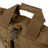 Close-up of the Condor Aviator Bag 15L in brown tactical fabric with reinforced handles, a zipper, and a black plastic clip on a loop—perfect for military or first responder use.