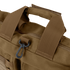 Close-up of the Condor Aviator Bag 15L in brown tactical fabric with reinforced handles, a zipper, and a black plastic clip on a loop—perfect for military or first responder use.