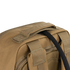 A close-up of the Condor Prime Pack 21L tan canvas bag highlights its handle, zipper, and strap attachment on a plain white background.