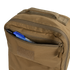 The Condor Prime Pack 21L is a tan tactical backpack with a partially open front zippered pocket, revealing black and blue pens and a marker—perfect for first responders on the move.