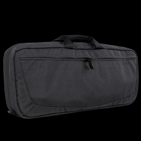 The Condor 27 Dispatch Take Down Case is a black rectangular bag with a top handle, zippered front pocket, and red-stitched accents—ideal for EDC or organizing essentials at the range.