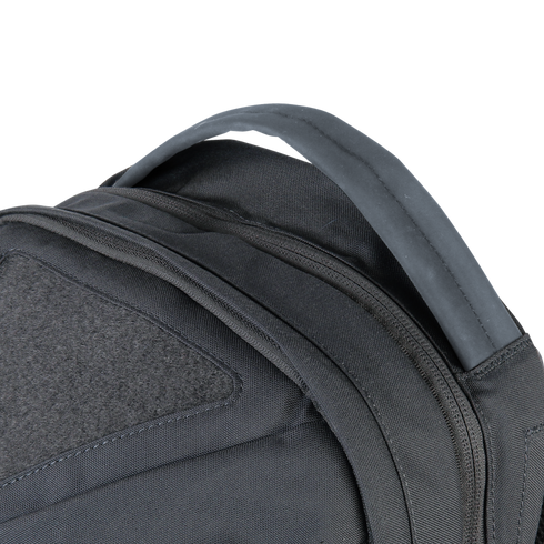 Close-up of the upper section of the Condor Elite Fail Safe Urban Backpack Gen II 18L by Condor, highlighting its padded shoulder straps and reinforced carrying handle.