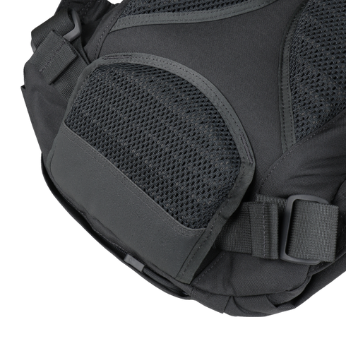 Close-up of the Condor Elite Fail Safe Urban Backpack Gen II 18L’s black pocket with mesh detailing and a plastic buckle strap by Condor, perfect for EDC or military use.