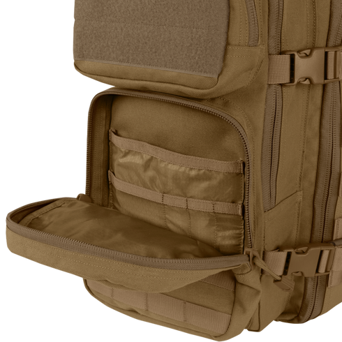 The Condor Compact Assault Backpack Gen II 24L in brown features multiple compartments and interior organizational slots, perfect for EDC or bushcraft, shown with one zippered pocket open.