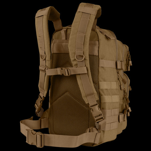 The Condor Compact Assault Backpack Gen II 24L in tan features multiple straps, padded shoulder supports, a mesh back panel, and side MOLLE webbing—ideal for military or law enforcement use.