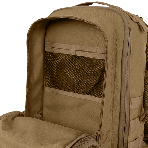 Close-up of the Condor Compact Assault Backpack Gen II 24L in tan, ideal for bushcraft or the range, featuring an open inner compartment with a mesh pocket and zipper.
