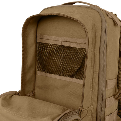 Close-up of the Condor Compact Assault Backpack Gen II 24L in tan, ideal for bushcraft or the range, featuring an open inner compartment with a mesh pocket and zipper.