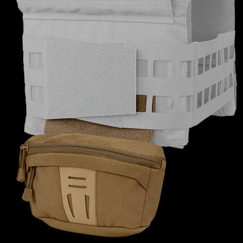 Close-up of the Condor Draw Down Waist Pack Gen III in tan, attached to the lower front of a light gray tactical vest featuring mesh and Velcro panels.