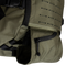 Close-up of the Condor Nomad Backpack 25L in olive green, featuring a zippered pocket and part of the main compartment with laser-cut MOLLE webbing.