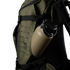 A khaki water bottle sits in the side pocket of a Condor Nomad Backpack 25L in olive green, featuring black straps and webbing.